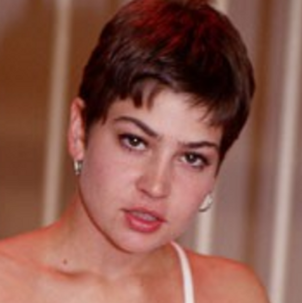 Vanessa Chase young with short hair.